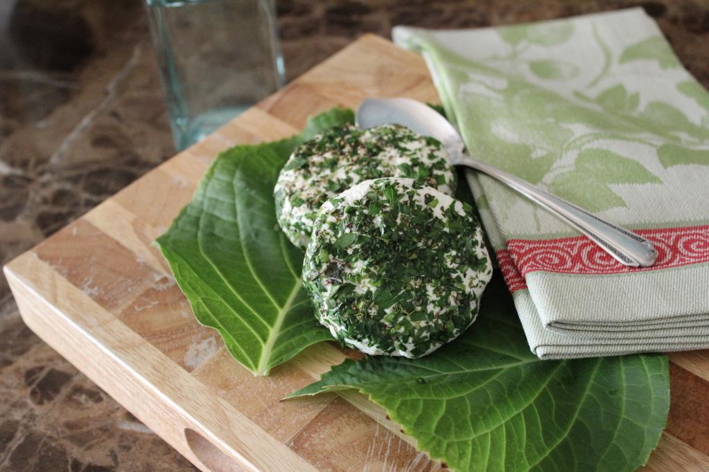 Baby Greens with Herb Crusted Cheese Rounds and Orange Vinaigrette