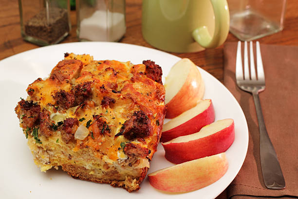 Glazed Onion and Sausage Breakfast Bread Pudding With Apples and Sherry